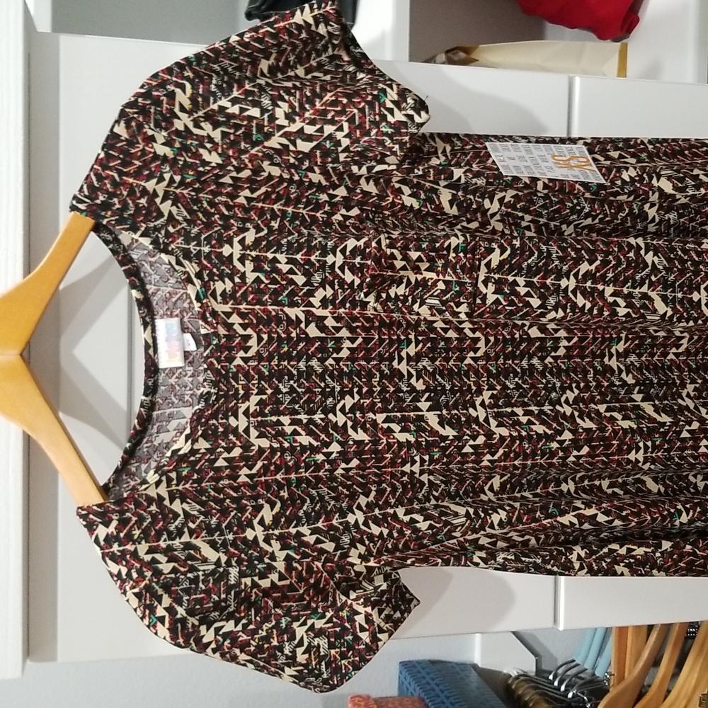Lularoe Carly Dress. Brand new with tags. This one is so pretty